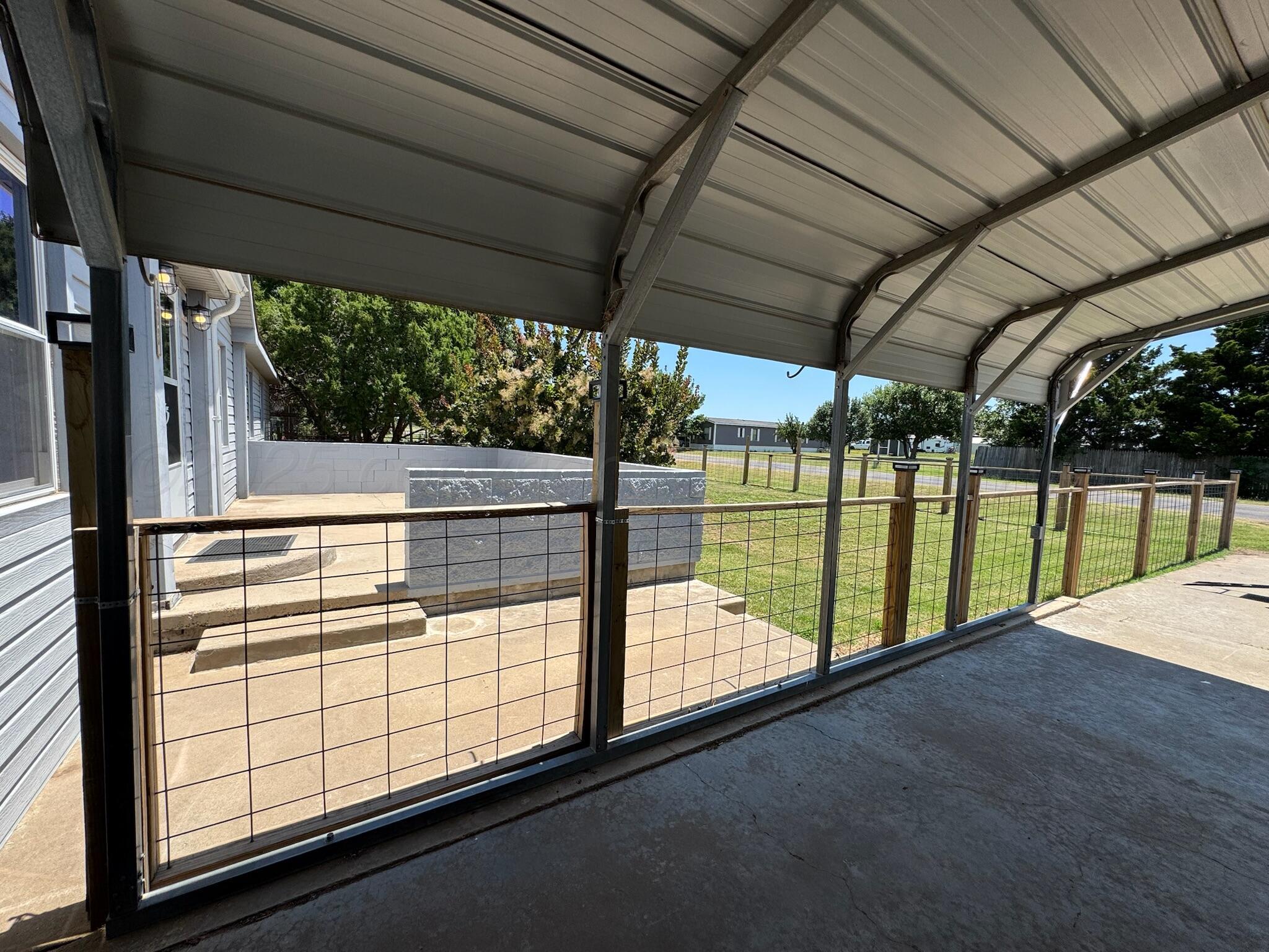 403 Aaron Road Fritch, TX 79036 - Photo 23 of 31 a view of a backyard