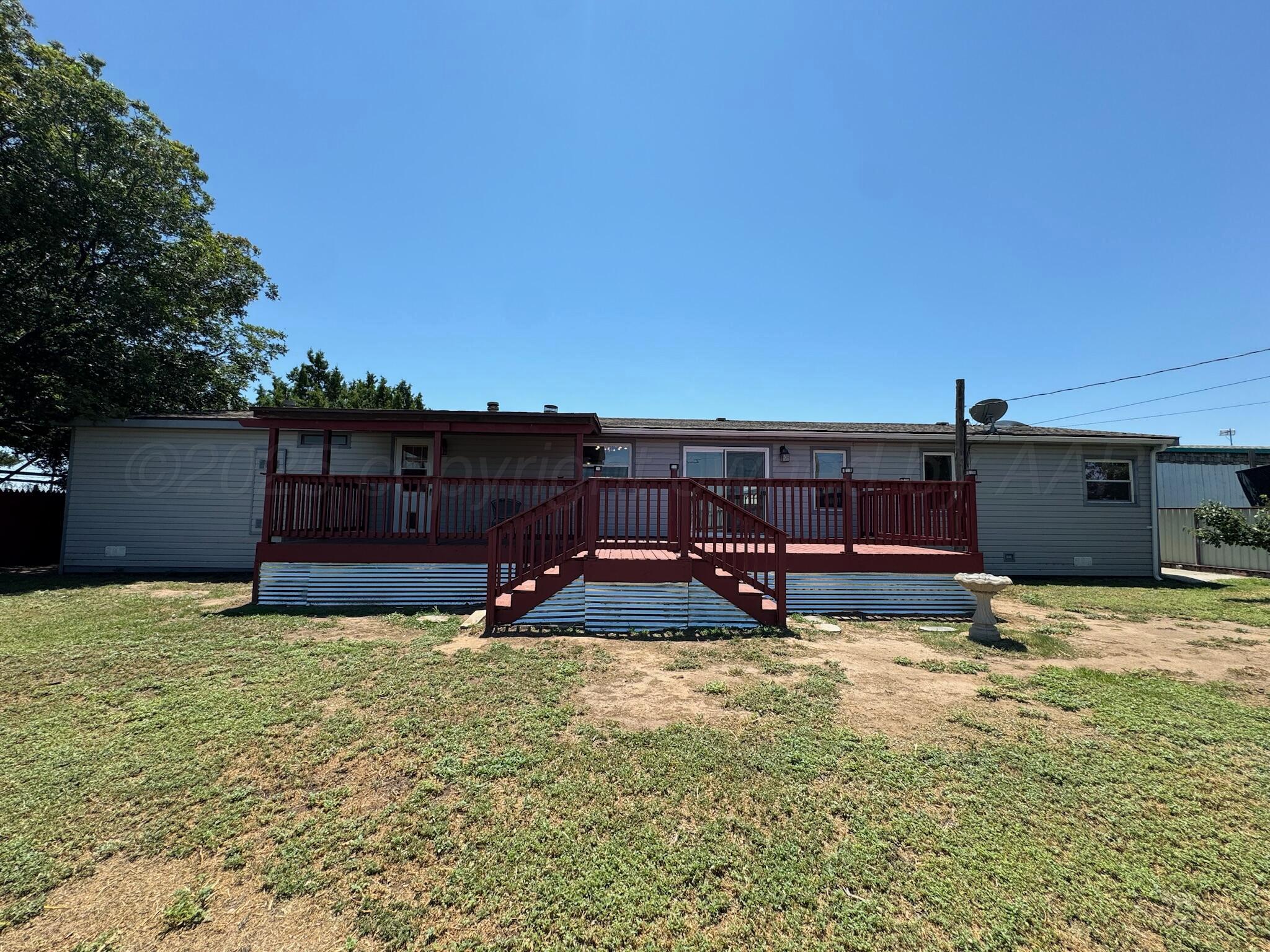 403 Aaron Road Fritch, TX 79036 - Photo 30 of 31 a view of a outdoor space with swimming pool