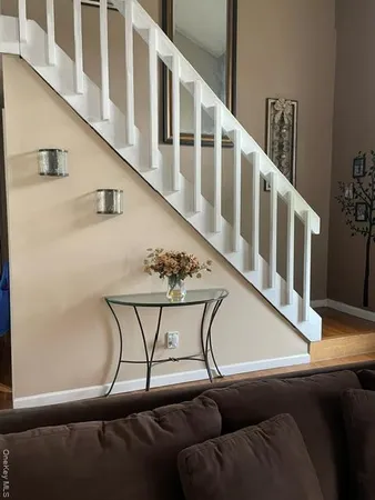 a view of staircase with lots of furniture