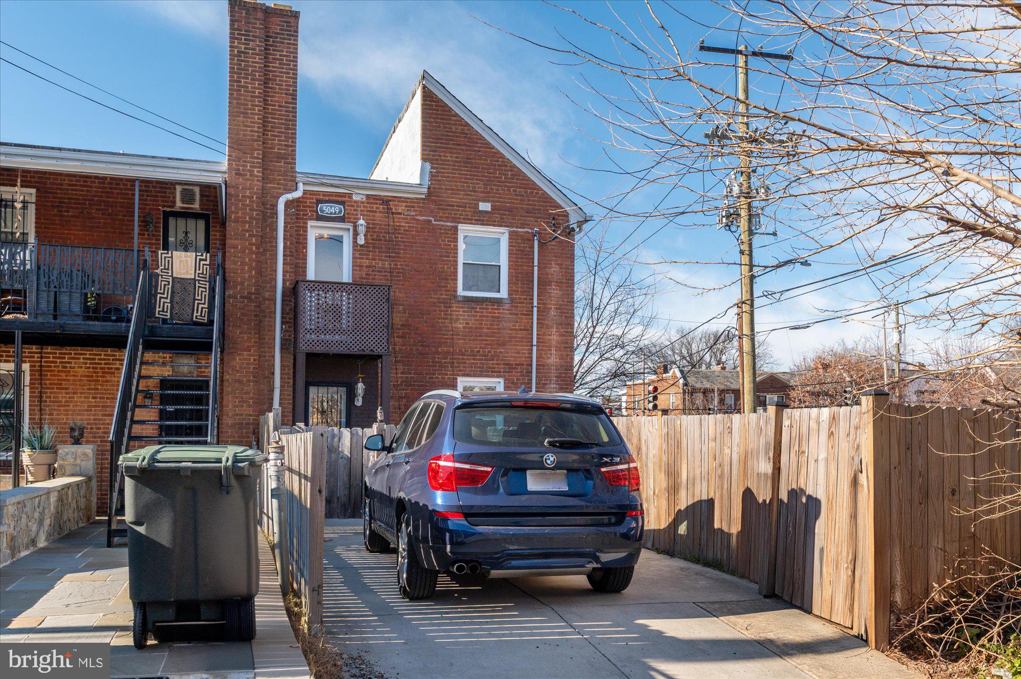 5049 North Capitol Street Northeast Washington, DC 20011 - Photo 18 of 20 a car parked in front of a house