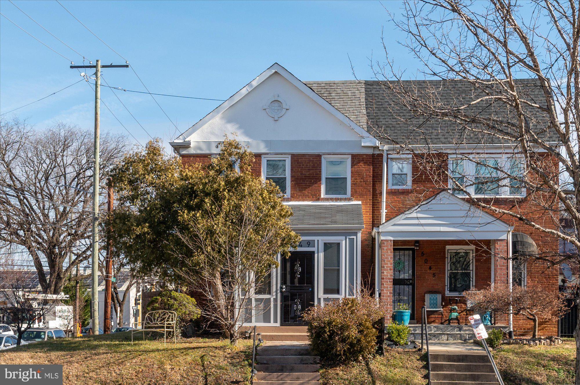 5049 North Capitol Street Northeast Washington, DC 20011 - Photo 19 of 20 a front view of a house with garden
