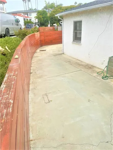 a view of a backyard of the house