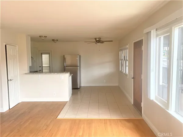 a view of a livingroom with wooden floor