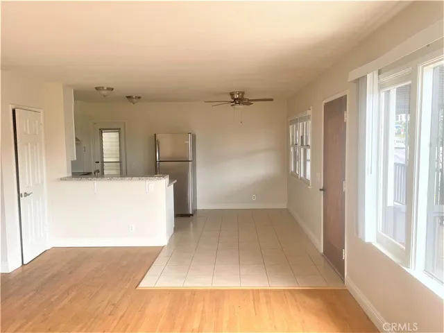 a view of a livingroom with wooden floor