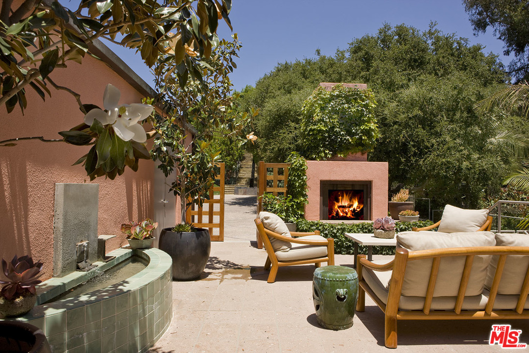 1827 Westridge Road Los Angeles, CA 90049 - Photo 14 of 34 a building outdoor space with patio furniture