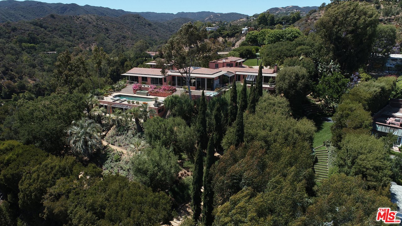 1827 Westridge Road Los Angeles, CA 90049 - Photo 6 of 34 an aerial view of city with tall trees
