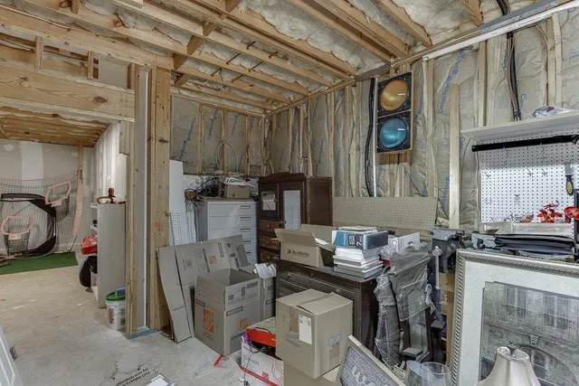 a view of a chair and table on the deck