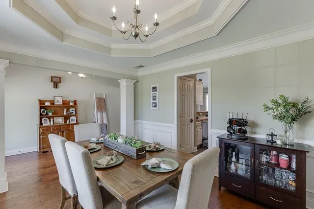 a view of a dining room with furniture