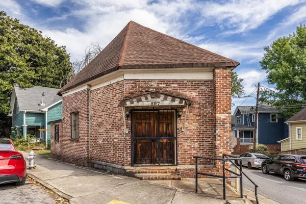 a front view of a house with parking