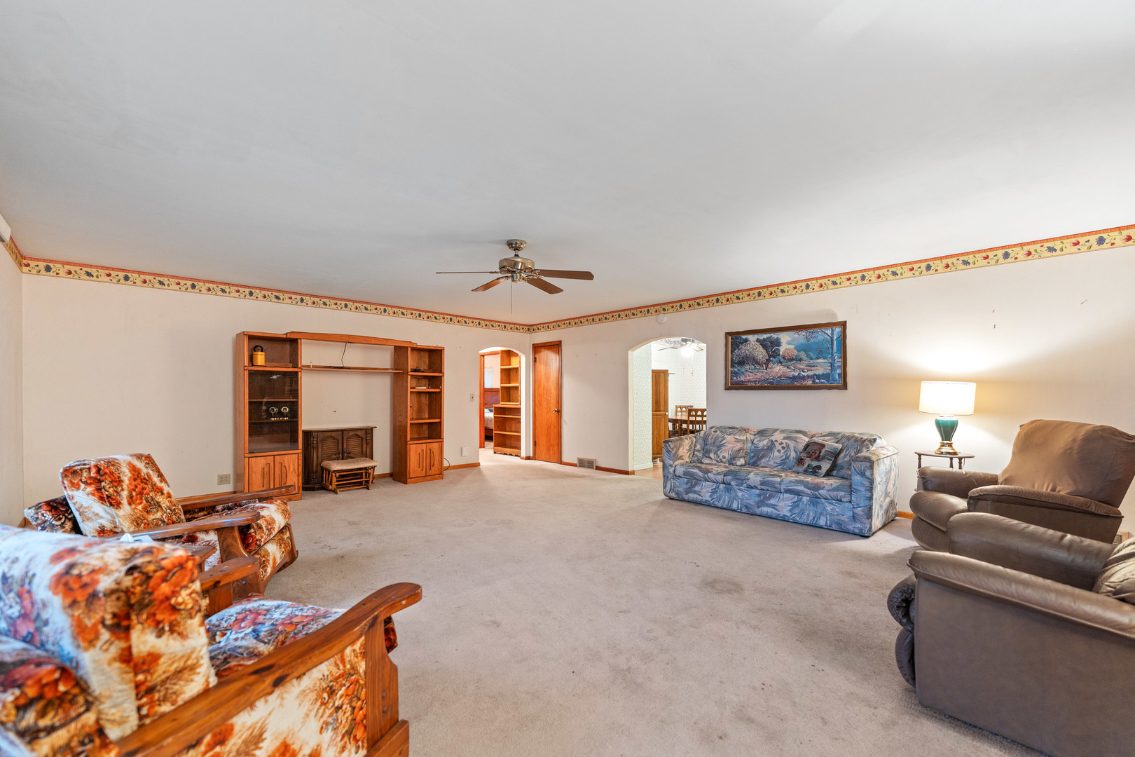 50W762 Ramm Road Maple Park, IL 60151 - Photo 2 of 37 a living room with furniture fireplace and a large window