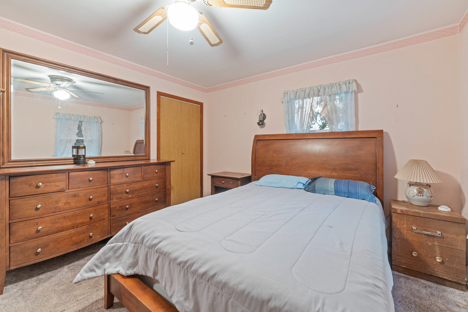 50W762 Ramm Road Maple Park, IL 60151 - Photo 5 of 37 a bedroom with a bed and a dresser