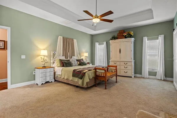 a bedroom with bed and a window