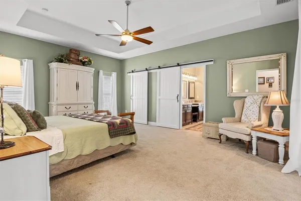 a bed room with furniture and a window