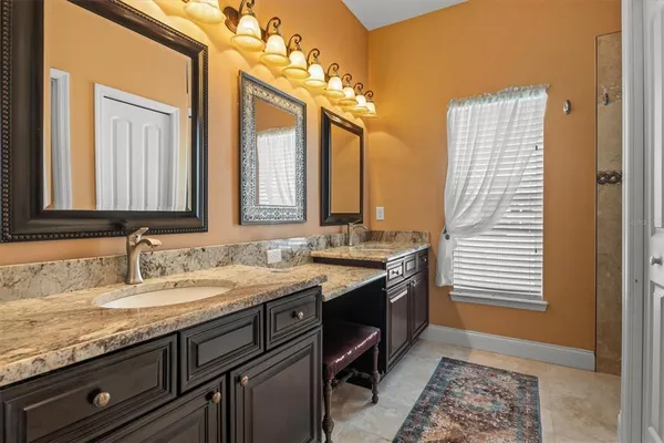 a bathroom with a toilet a sink and a bathtub