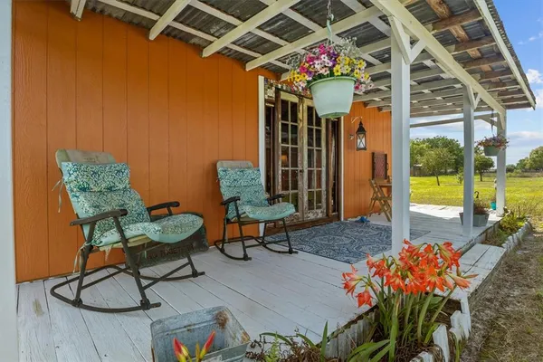 a view of a house with a big yard