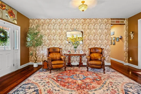 a living room with furniture and a window