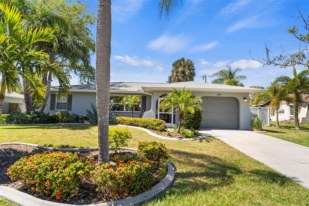 390 Randolph Road Venice, FL 34293 - Photo 1 of 1 a view of a house with backyard and sitting area