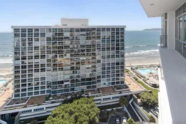 a view of a city with tall buildings