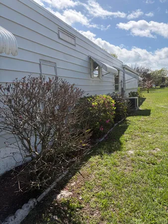 a view of a backyard of the house