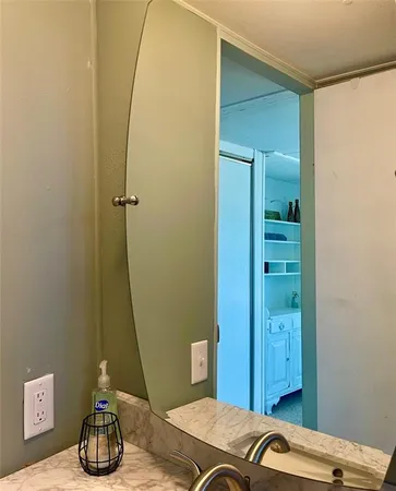 a view of a room that has a large window