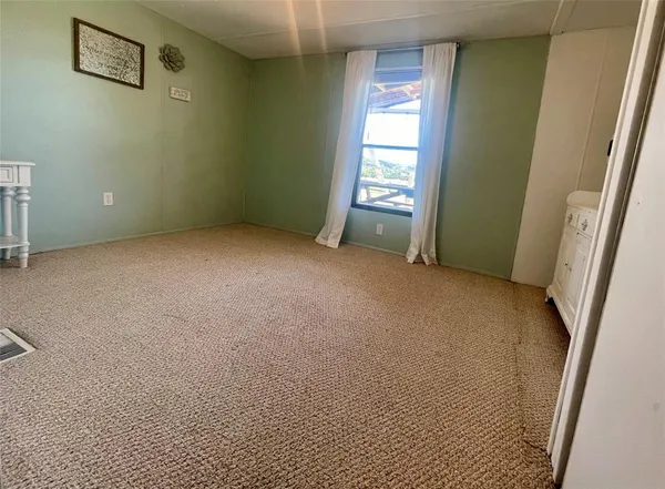 a view of a room with table and chair