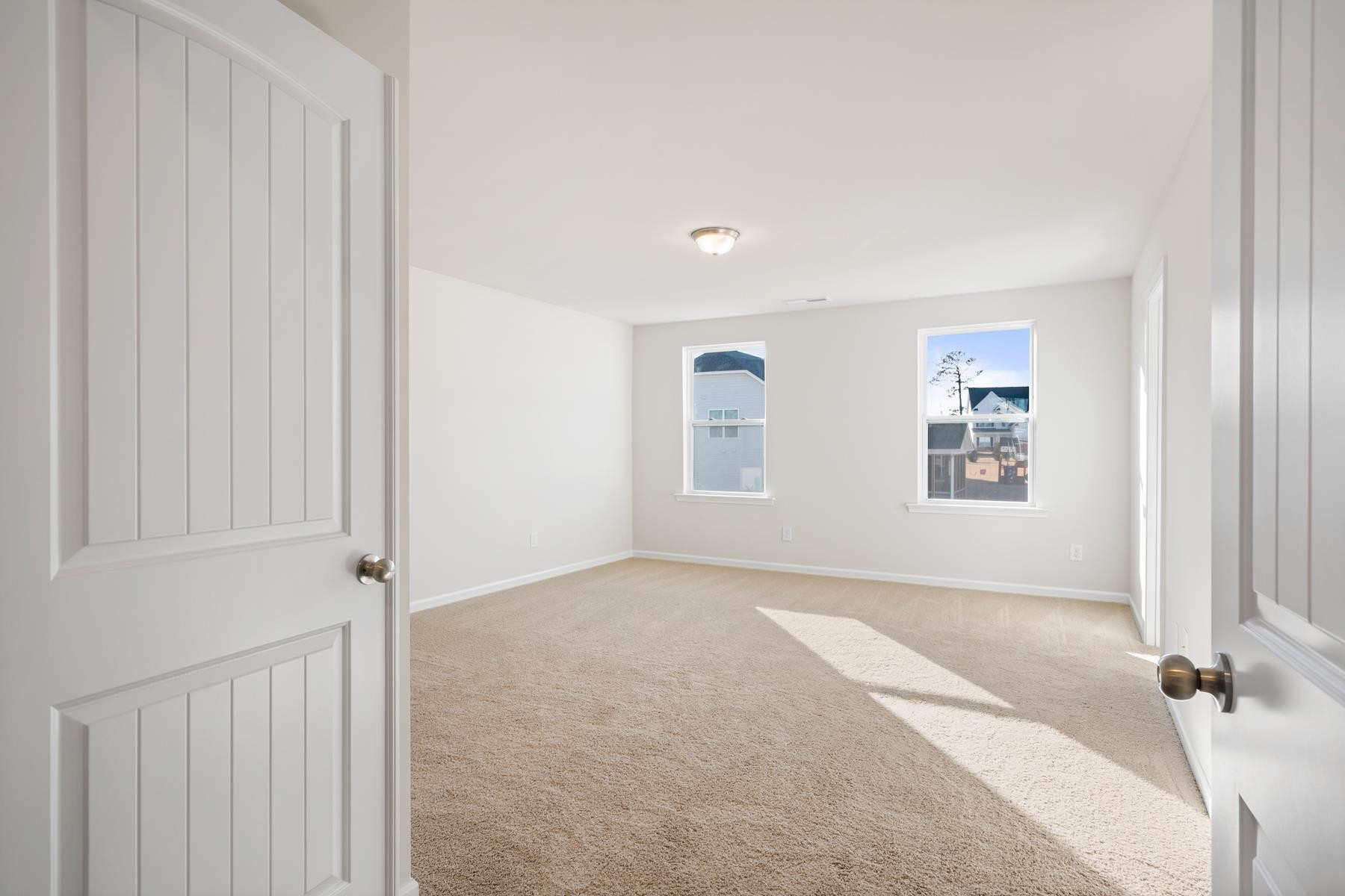 158 Karlov Road Garner, NC 27529 - Photo 20 of 37 an empty room with windows