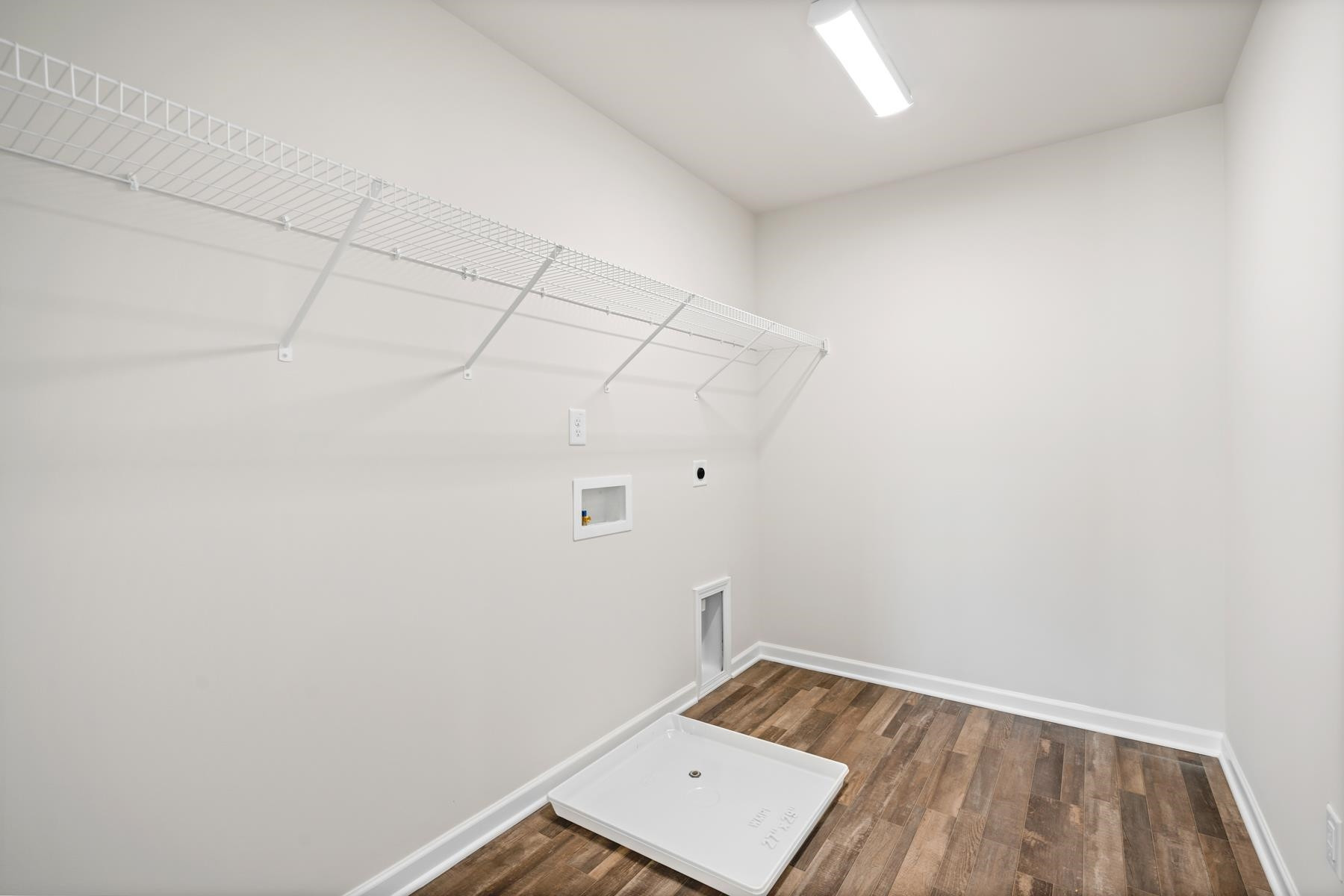 158 Karlov Road Garner, NC 27529 - Photo 24 of 37 a view of a room with racks on the wall