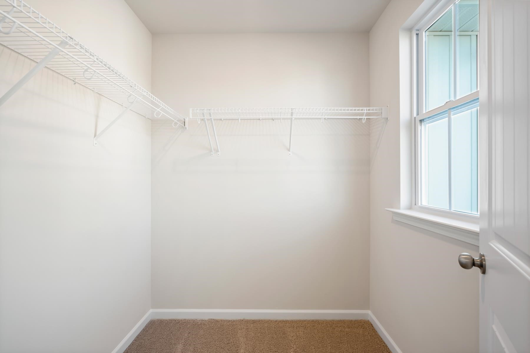158 Karlov Road Garner, NC 27529 - Photo 27 of 37 a view of small space with racks on the wall