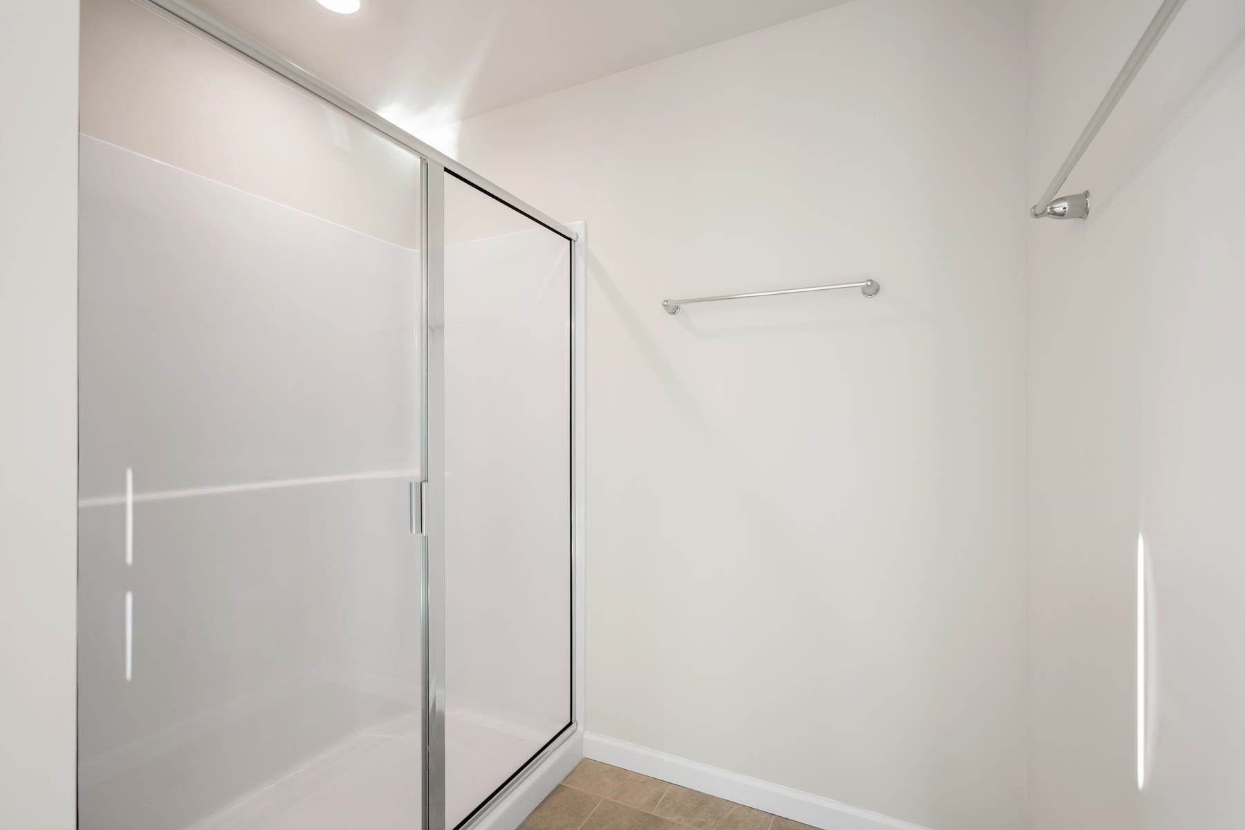 158 Karlov Road Garner, NC 27529 - Photo 32 of 37 a bathroom with a shower