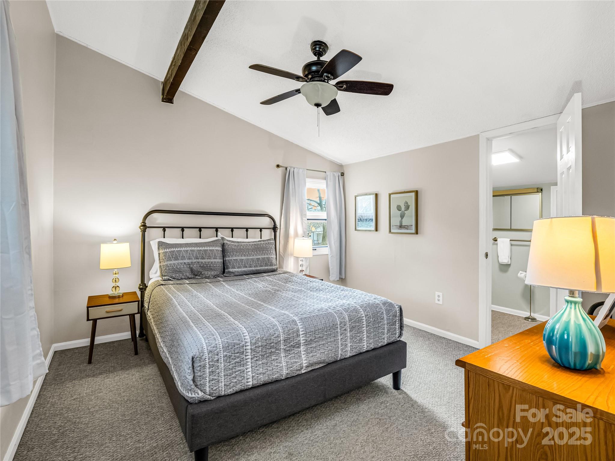 486 Oxford Road Lake Junaluska, NC 28745 - Photo 21 of 35 a bedroom with a bed and window
