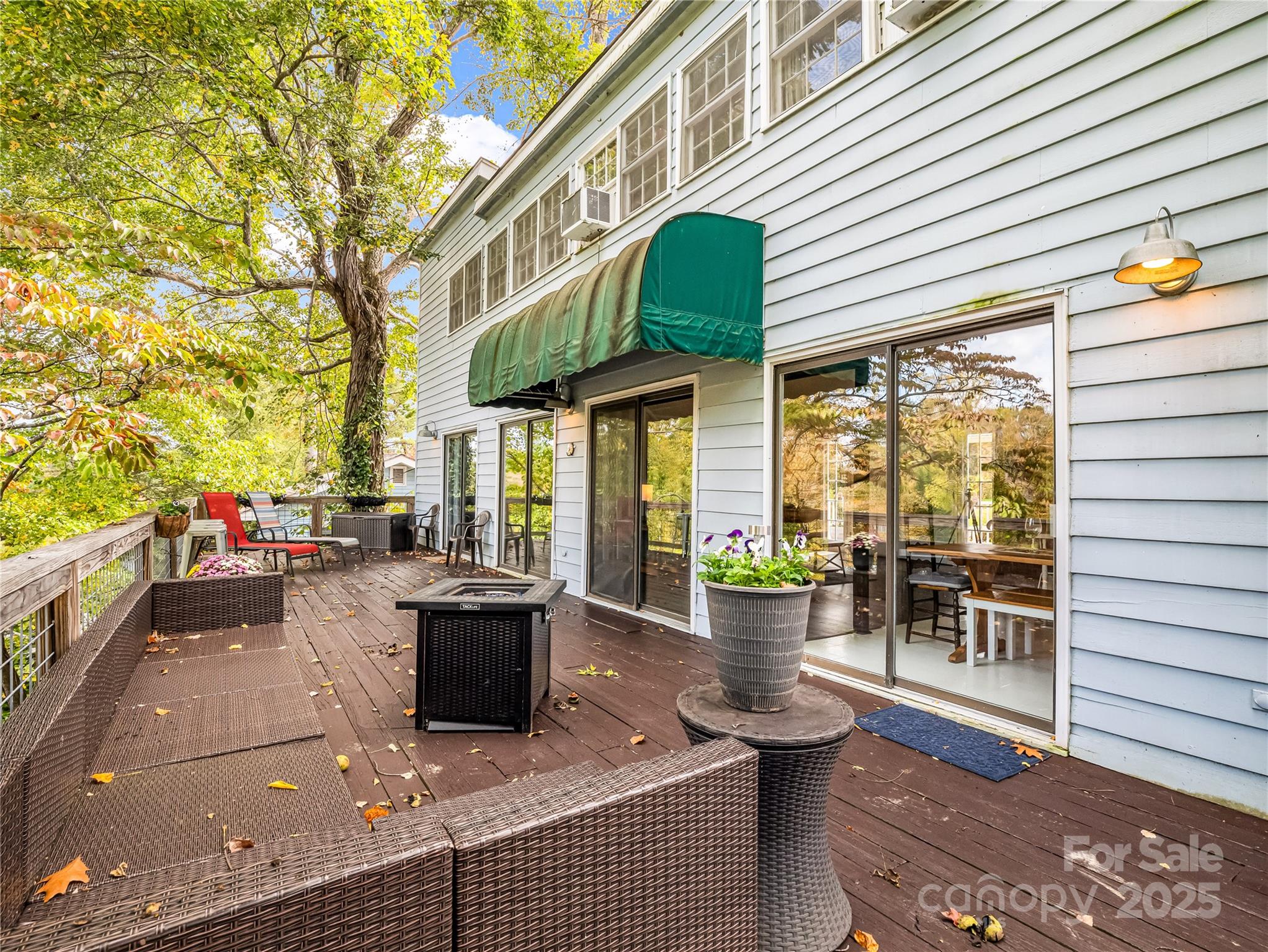 486 Oxford Road Lake Junaluska, NC 28745 - Photo 27 of 35 a view of a patio with couches and potted plants