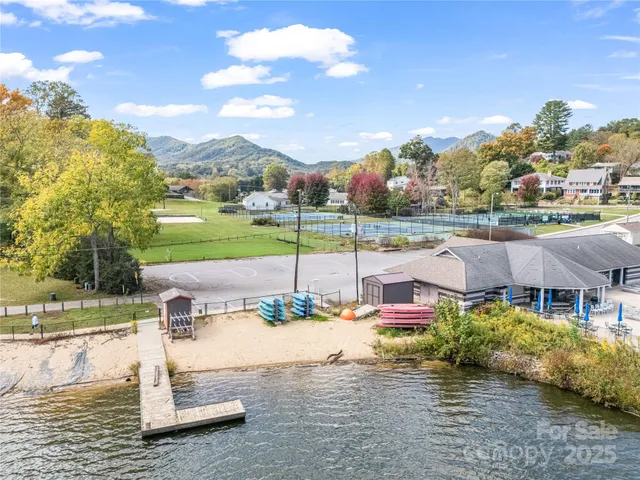 a view of a lake with a building in the background