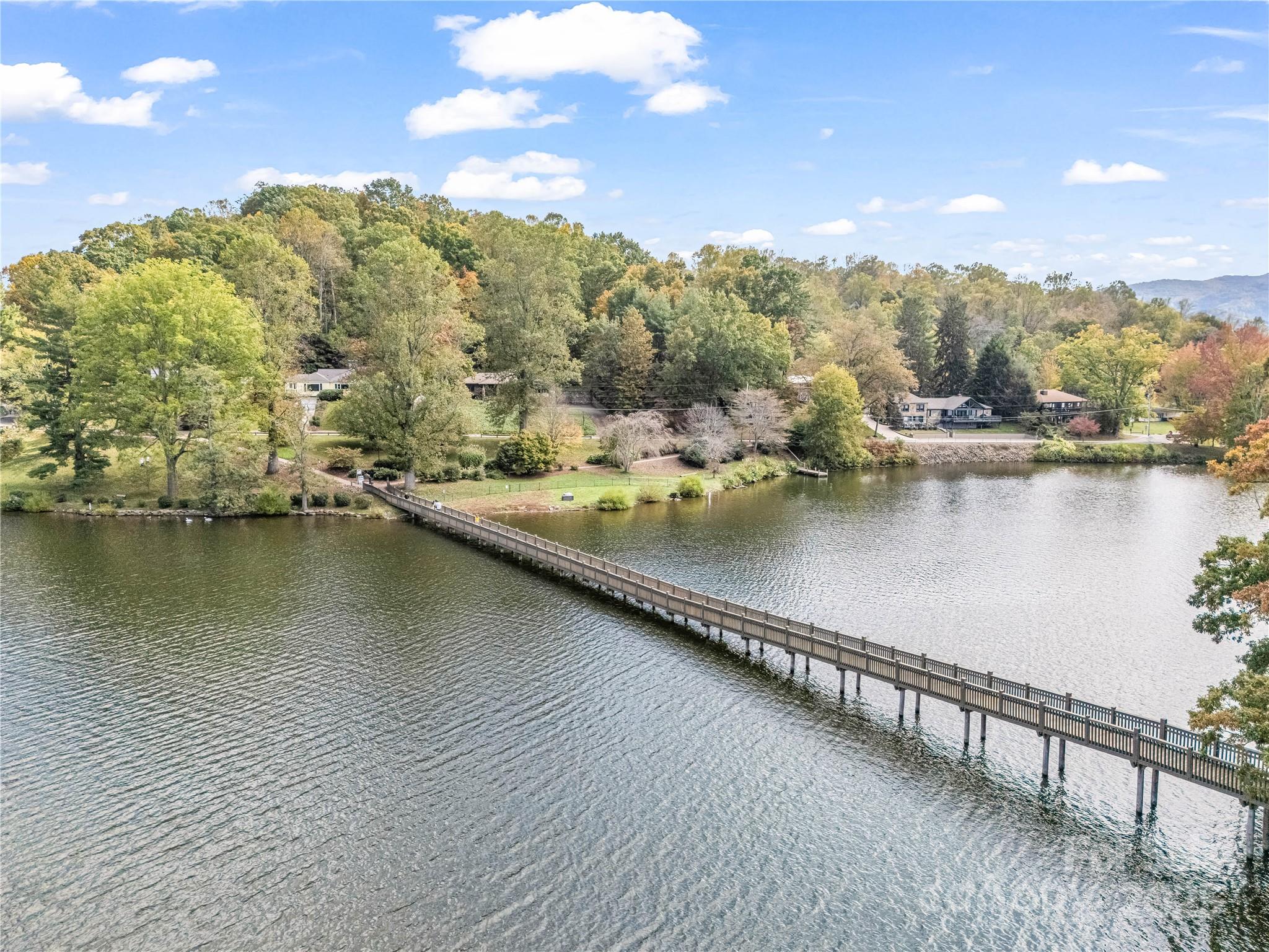 486 Oxford Road Lake Junaluska, NC 28745 - Photo 4 of 35 a view of a lake with a mountain