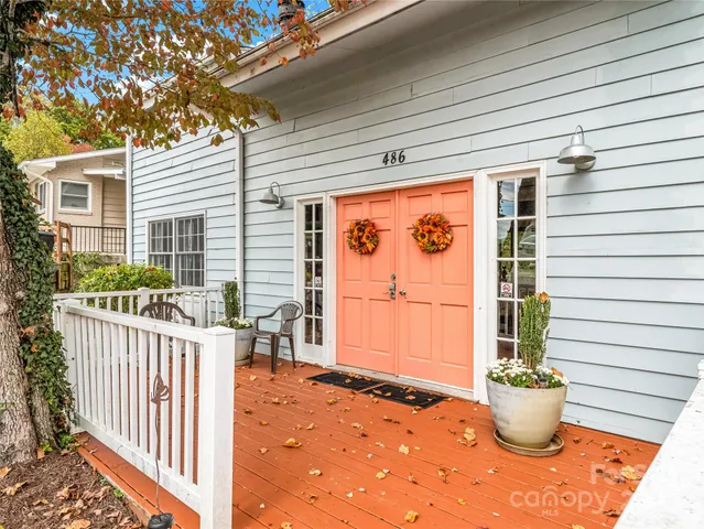 a view of a porch with furniture