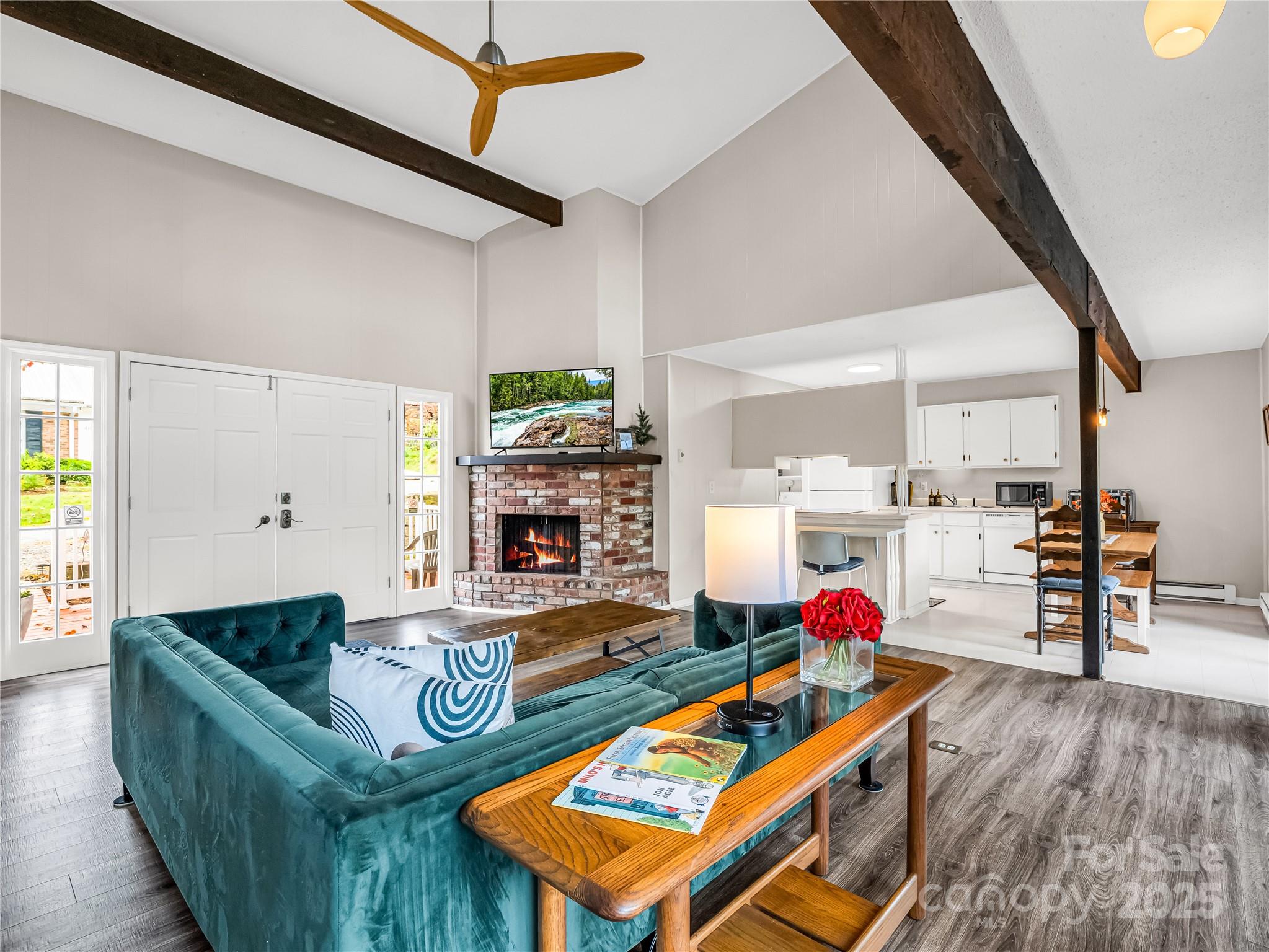 486 Oxford Road Lake Junaluska, NC 28745 - Photo 8 of 35 a living room with furniture and a wooden floor