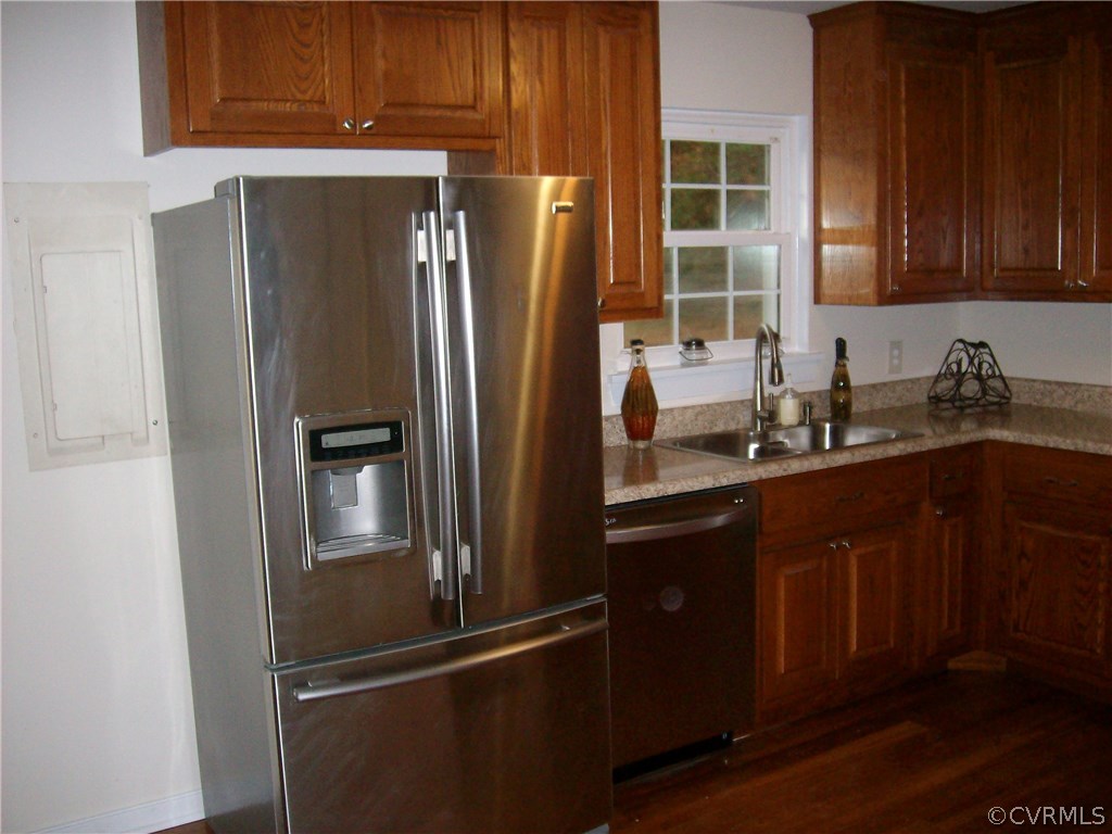 5425 West Hundred Road Chester, VA 23831 - Photo 10 of 14 a kitchen with stainless steel appliances granite countertop a refrigerator and a sink