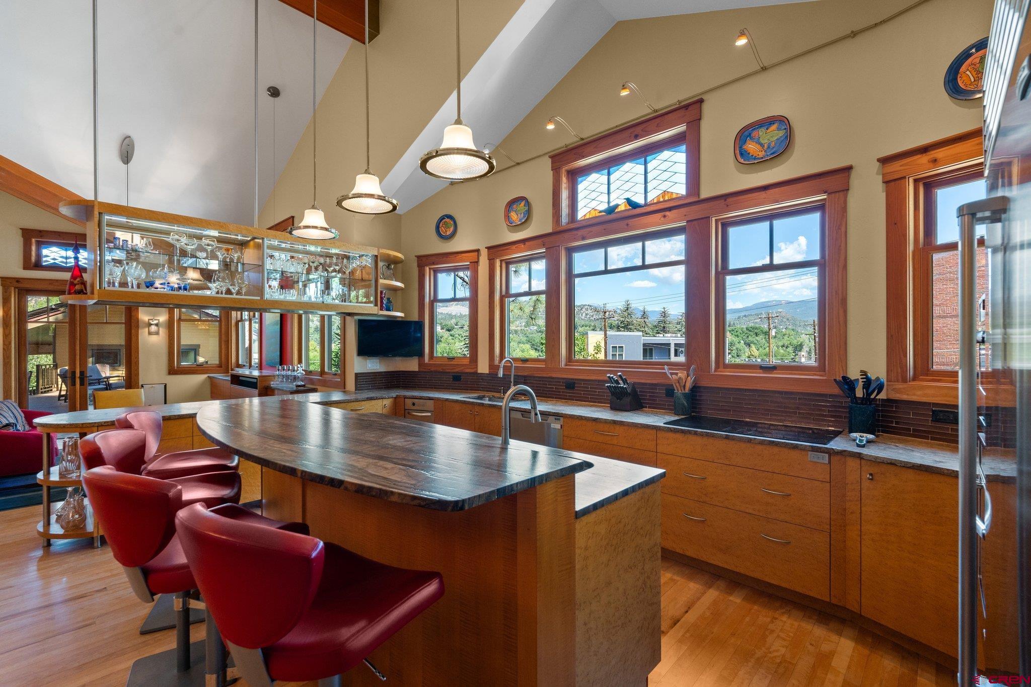 1393 East 3rd Avenue Durango, CO 81301 - Photo 14 of 35 a kitchen with stainless steel appliances granite countertop a sink and a large window
