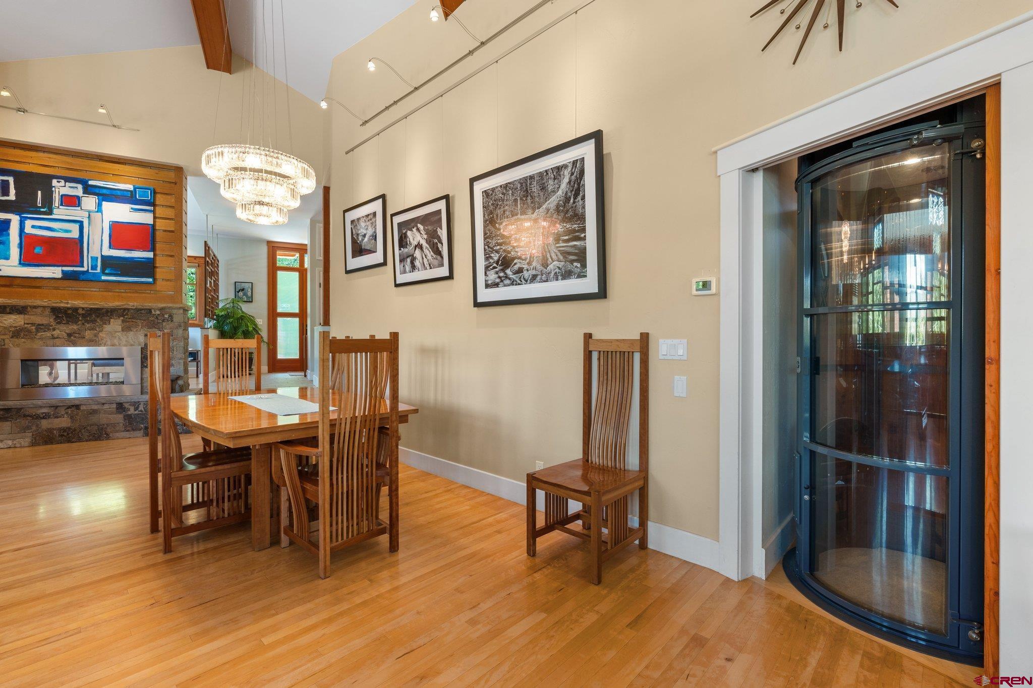1393 East 3rd Avenue Durango, CO 81301 - Photo 15 of 35 a view of a dining room with furniture window and wooden floor