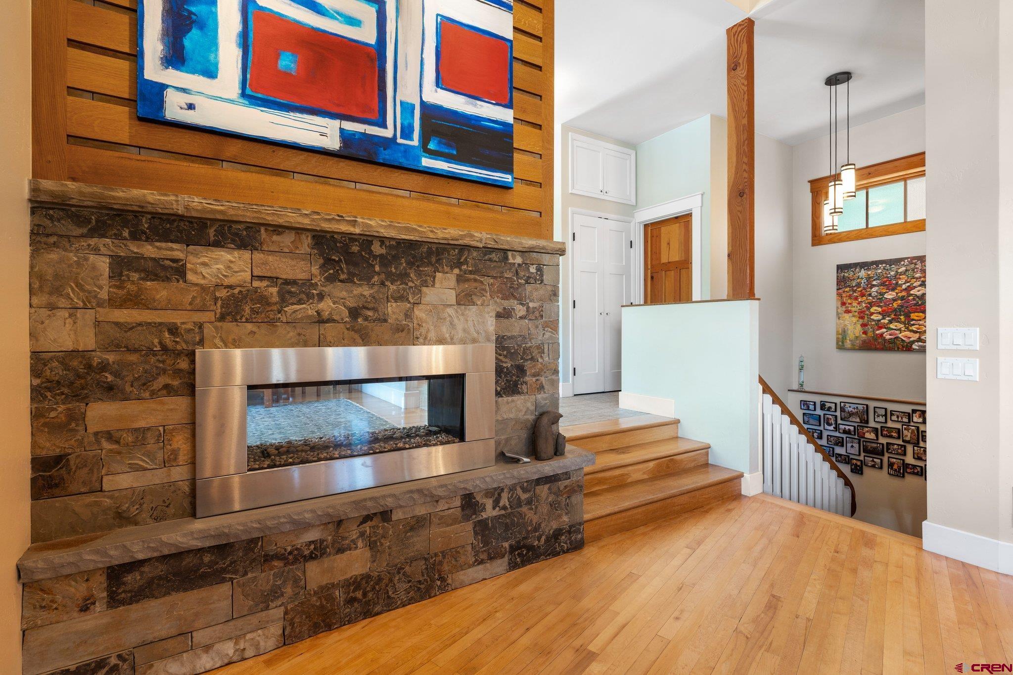 1393 East 3rd Avenue Durango, CO 81301 - Photo 21 of 35 a view of a fireplace with windows