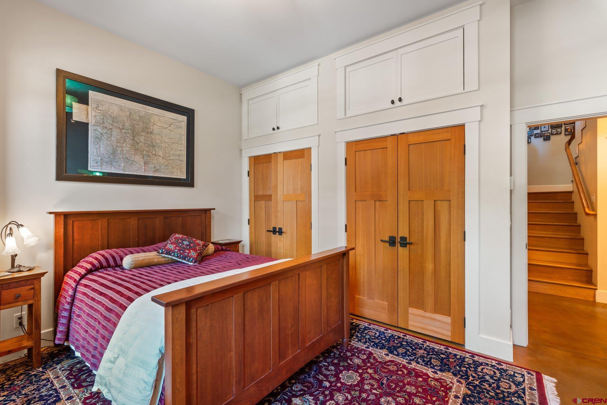 1393 East 3rd Avenue Durango, CO 81301 - Photo 23 of 35 a bedroom with a bed and a window