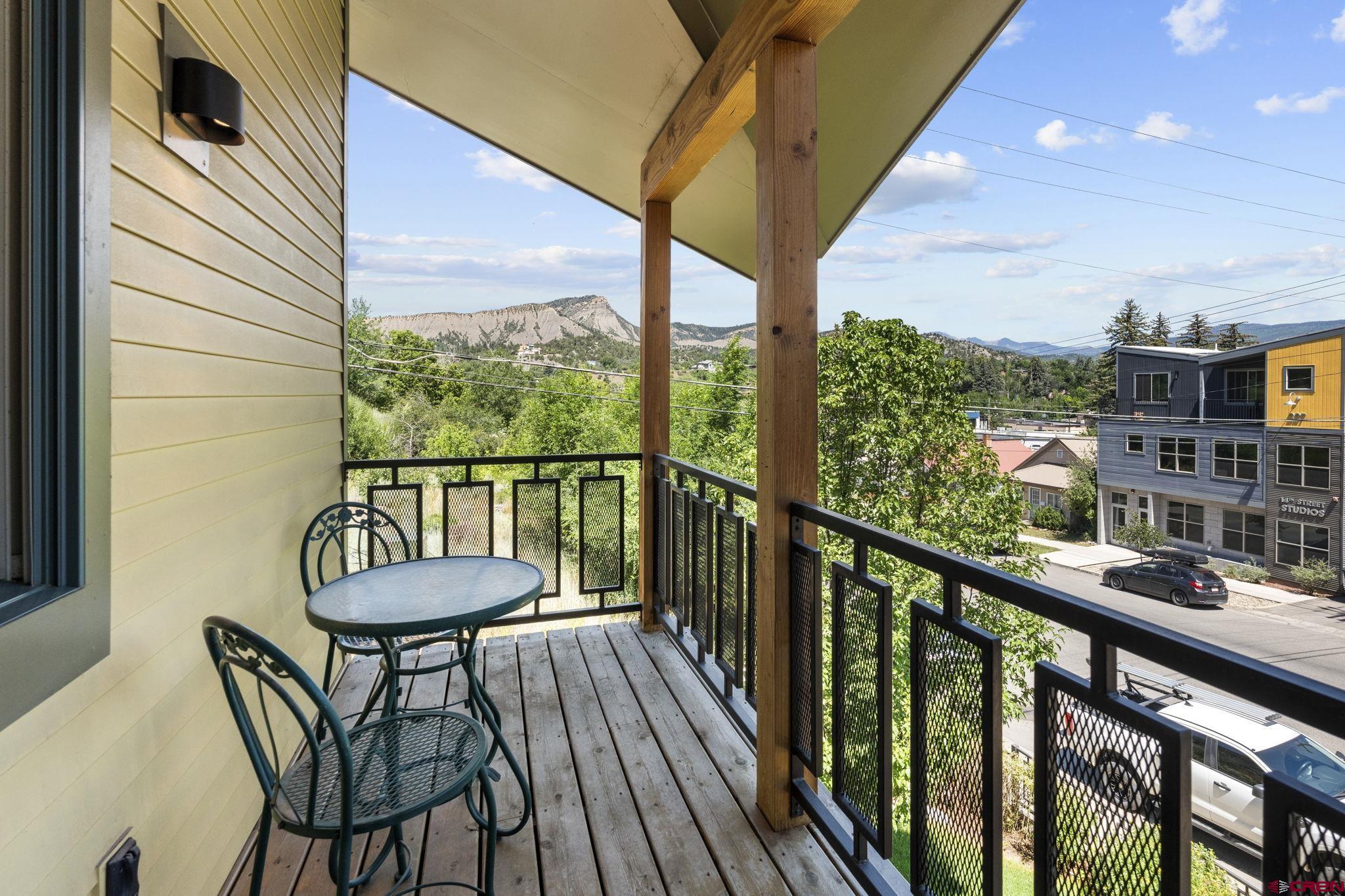 1393 East 3rd Avenue Durango, CO 81301 - Photo 32 of 35 a view of a balcony with furniture