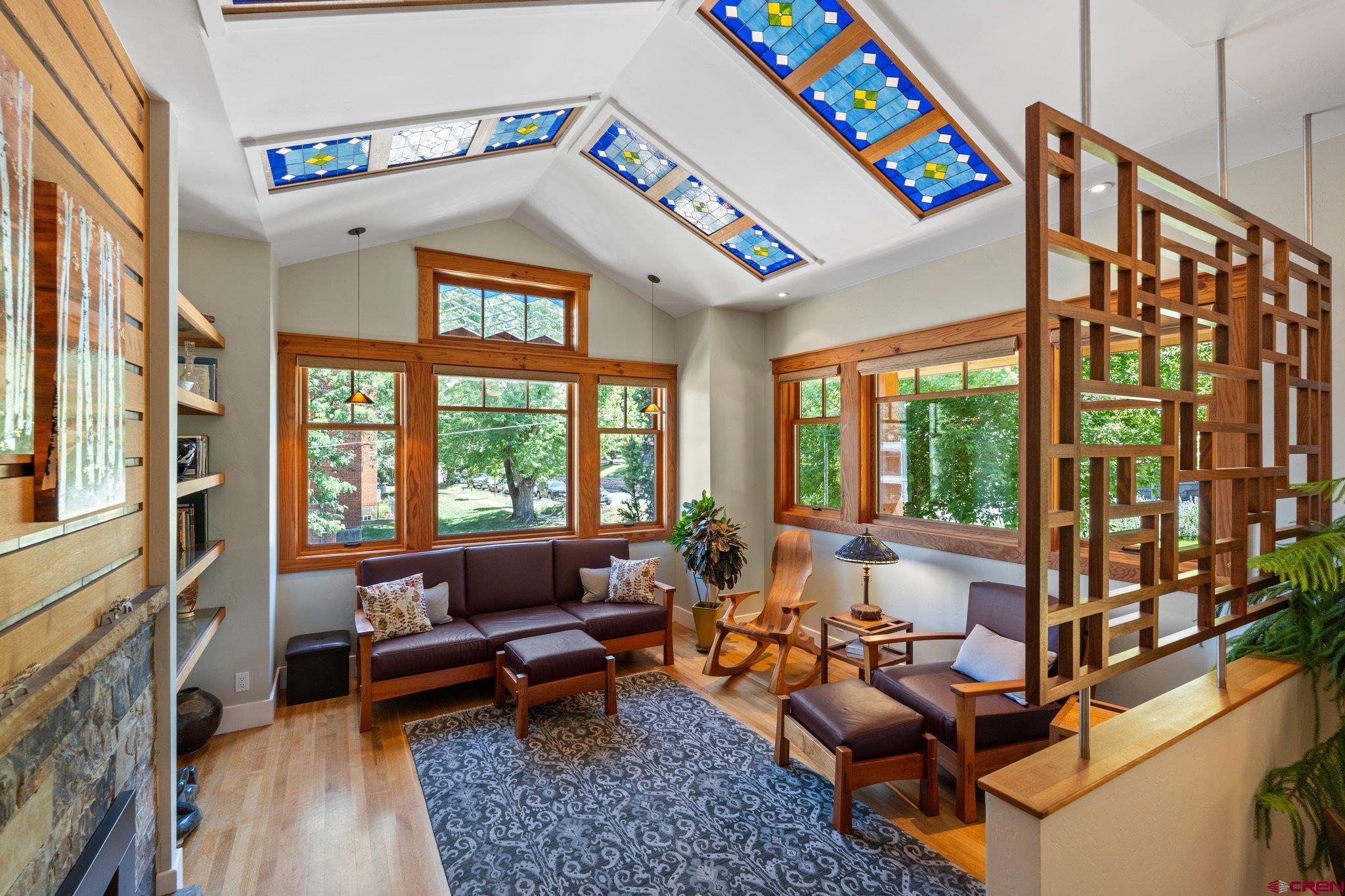 1393 East 3rd Avenue Durango, CO 81301 - Photo 4 of 35 a living room with furniture and a floor to ceiling window
