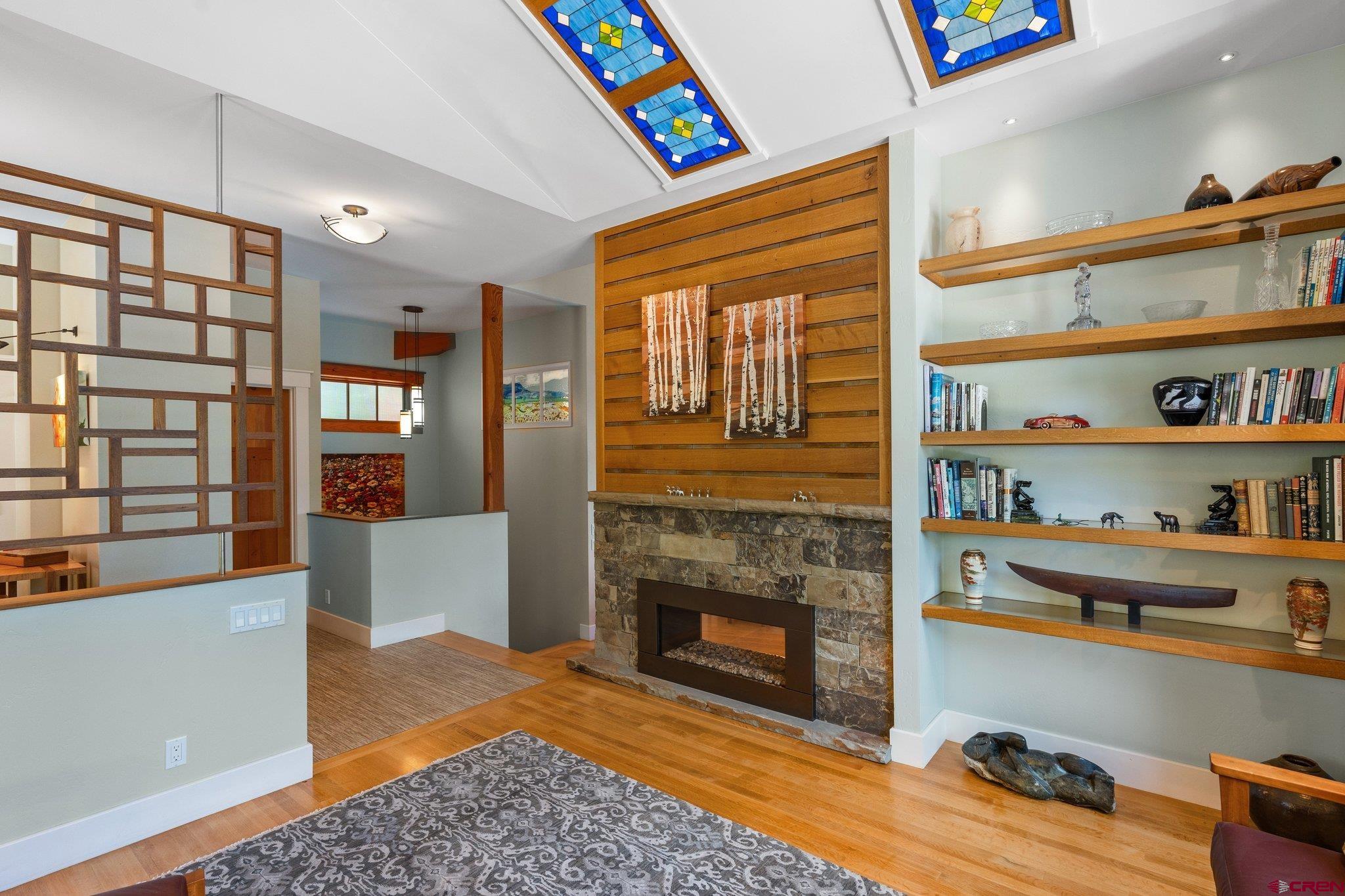 1393 East 3rd Avenue Durango, CO 81301 - Photo 5 of 35 a living room with furniture cabinets and wooden floor