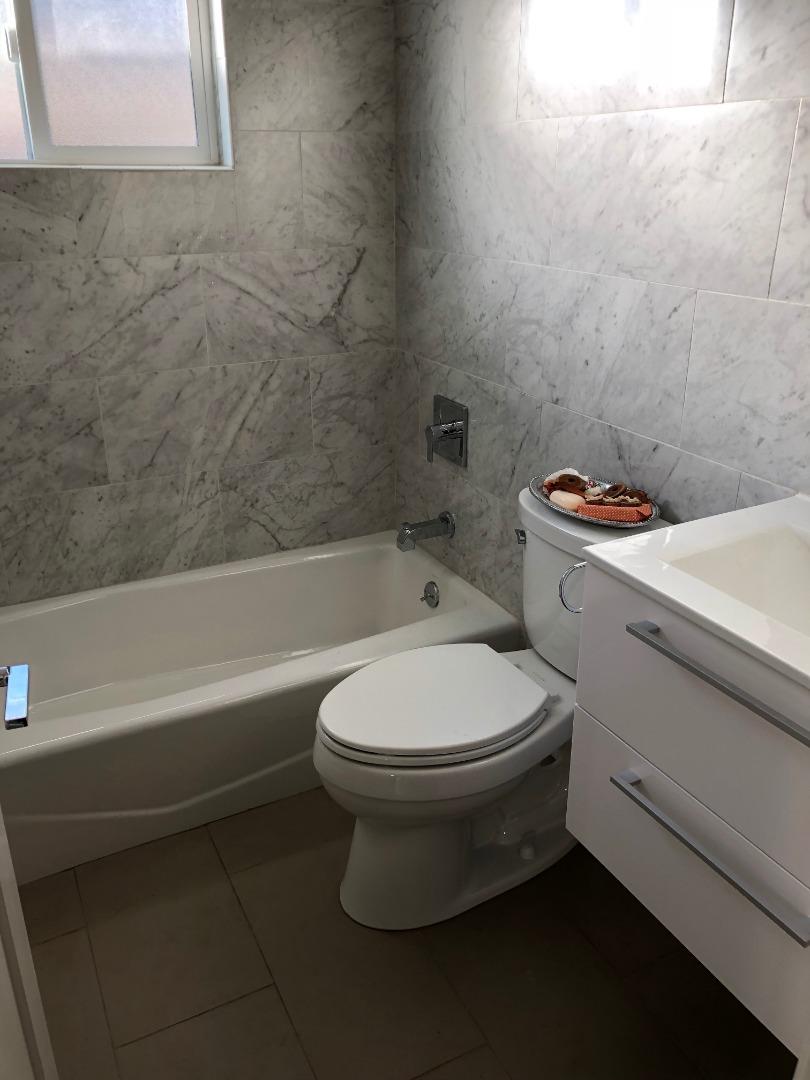838 Tulane Drive Mountain View, CA 94040 - Photo 15 of 20 a bathroom with a toilet and a bathtub