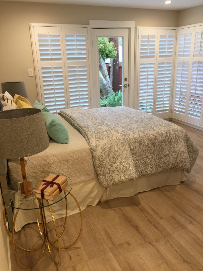 838 Tulane Drive Mountain View, CA 94040 - Photo 8 of 20 a bed sitting in a bedroom next to a window
