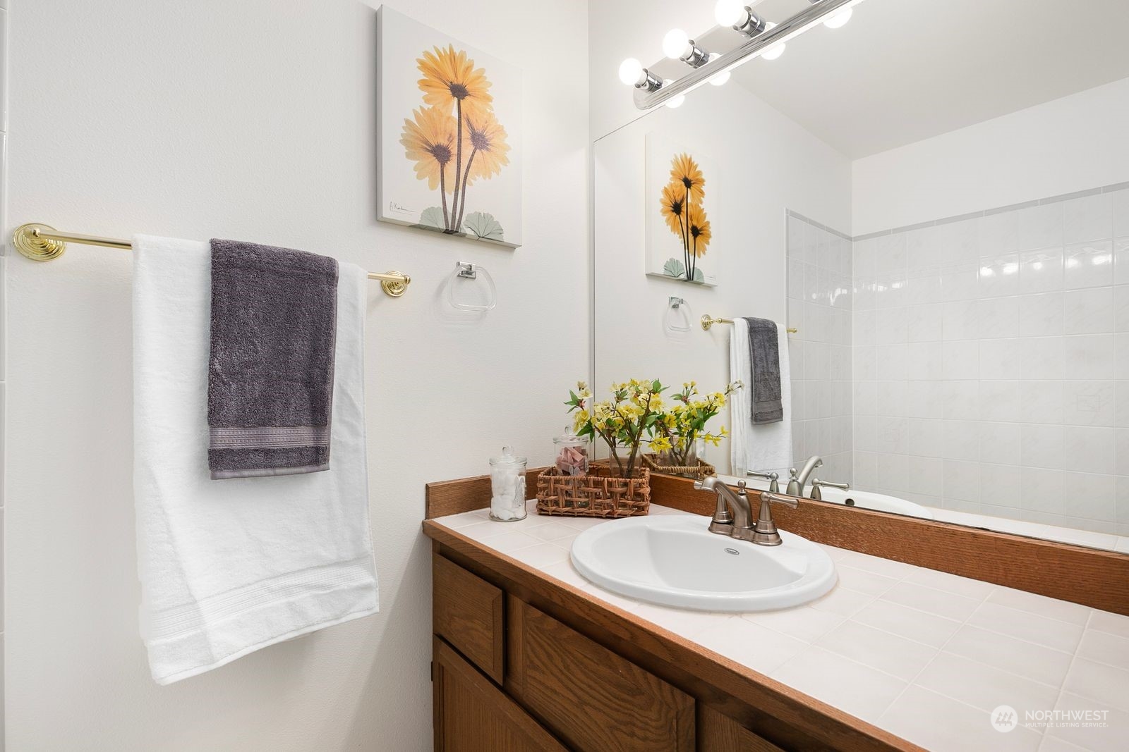 19410 34th Drive Southeast Bothell, WA 98012 - Photo 15 of 25 a bathroom with a sink and a mirror