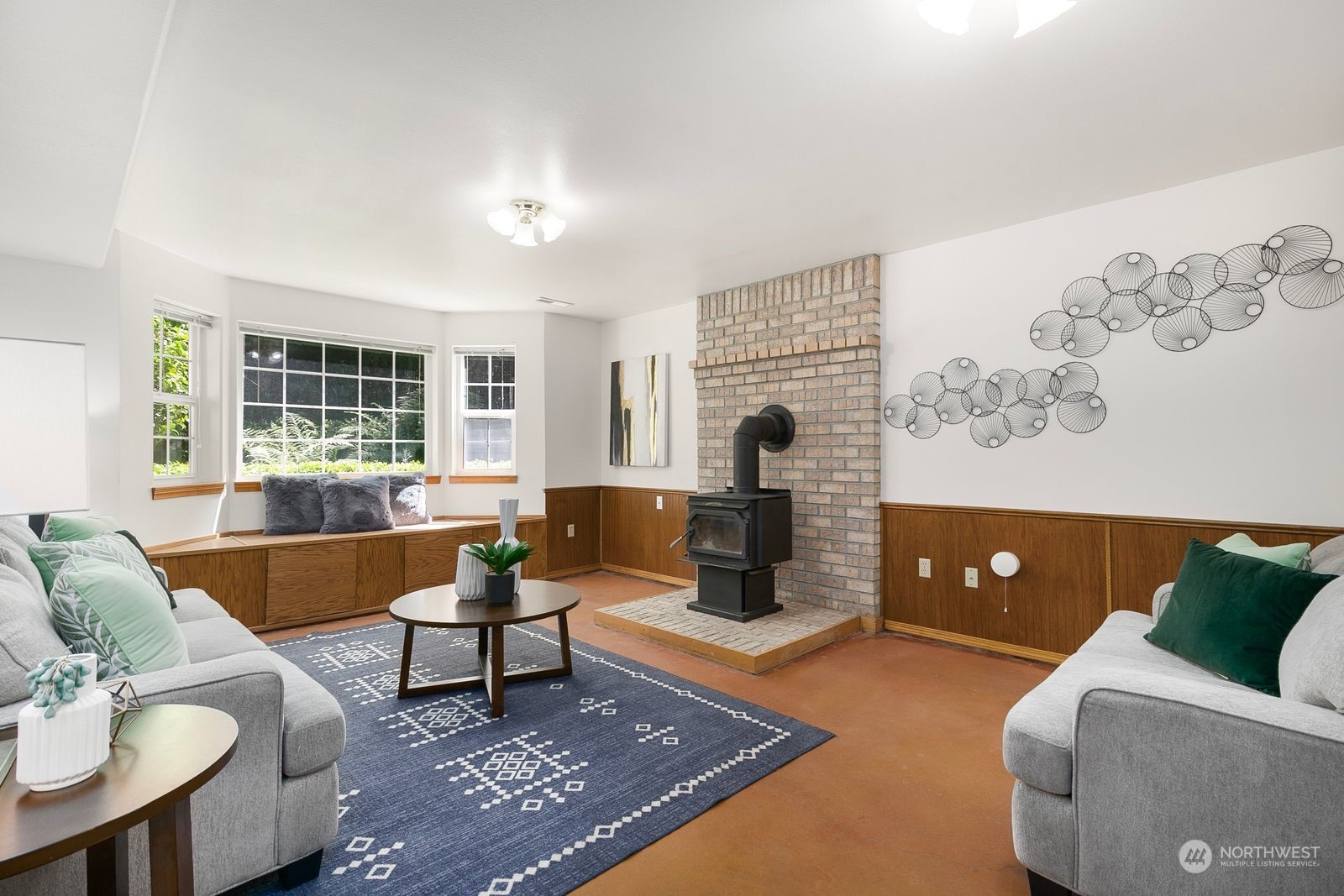 19410 34th Drive Southeast Bothell, WA 98012 - Photo 17 of 25 a living room with furniture and a fireplace
