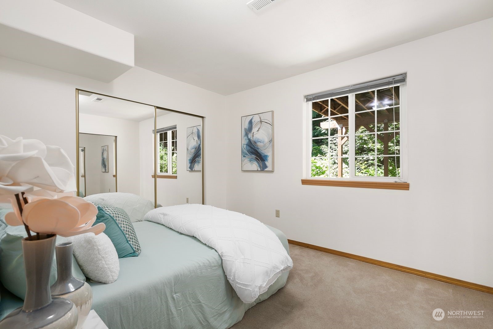 19410 34th Drive Southeast Bothell, WA 98012 - Photo 19 of 25 a bedroom with a bed and a window