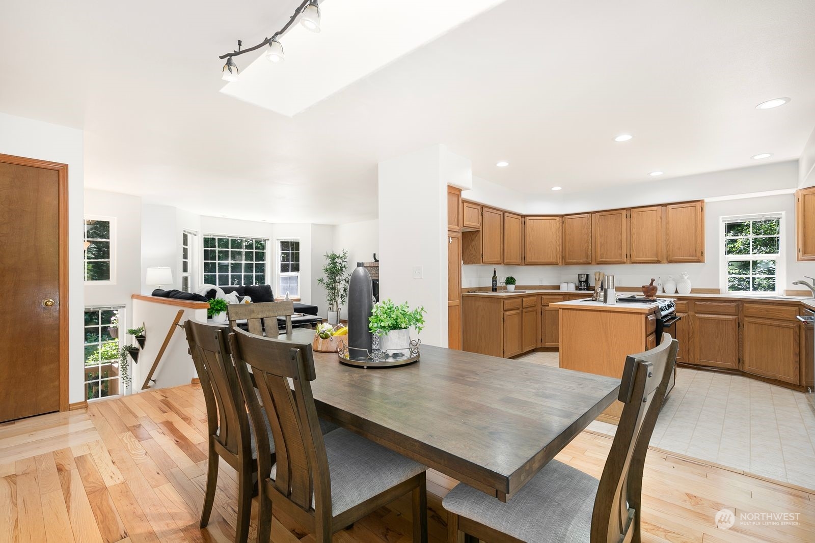 19410 34th Drive Southeast Bothell, WA 98012 - Photo 9 of 25 a kitchen with a table and chairs in it