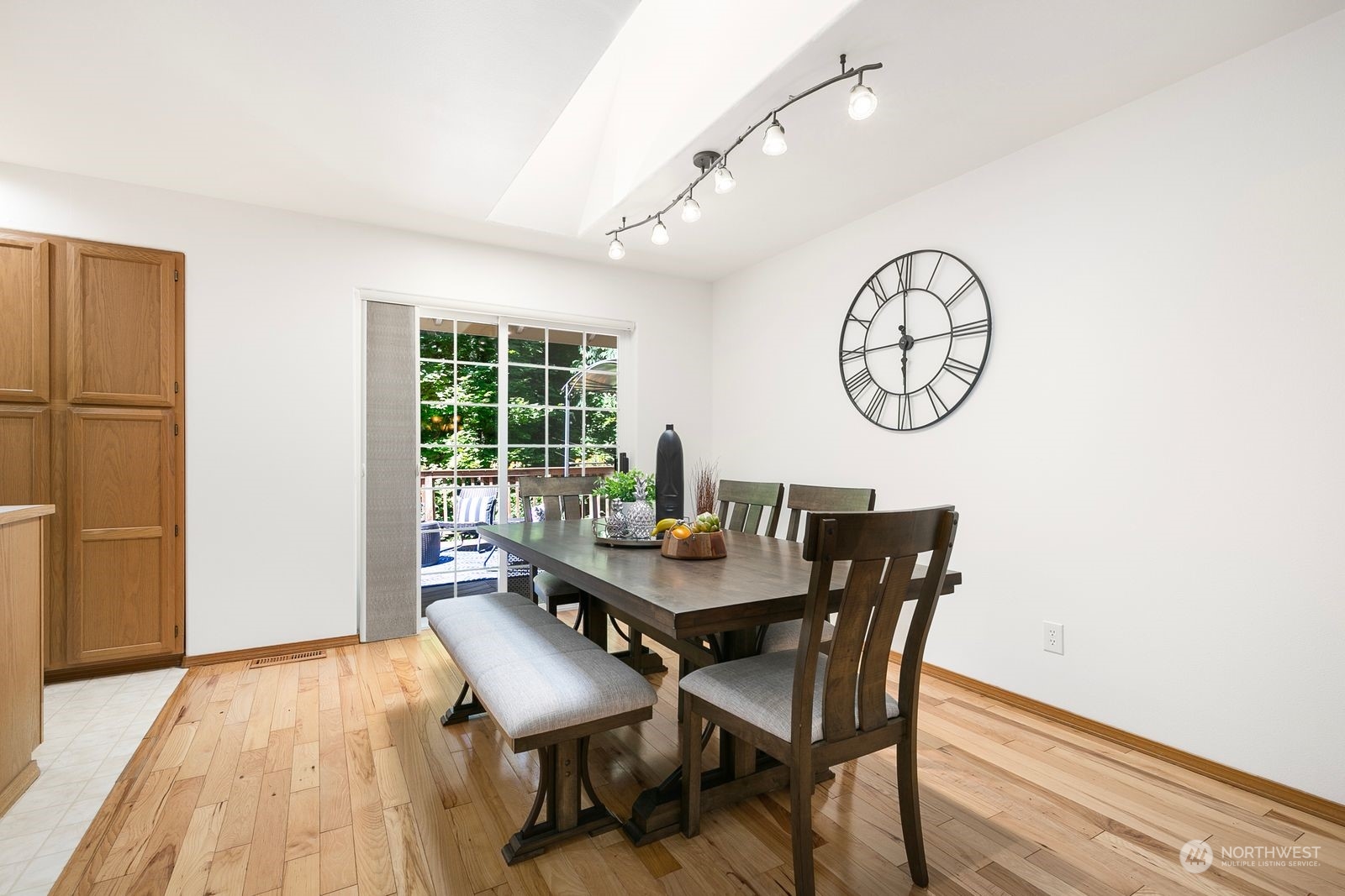19410 34th Drive Southeast Bothell, WA 98012 - Photo 10 of 25 a view of a dining room with furniture window and wooden floor
